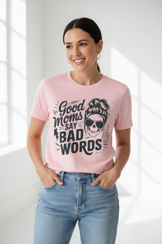 Good Moms Say Bad Words tee worn on pink shirt