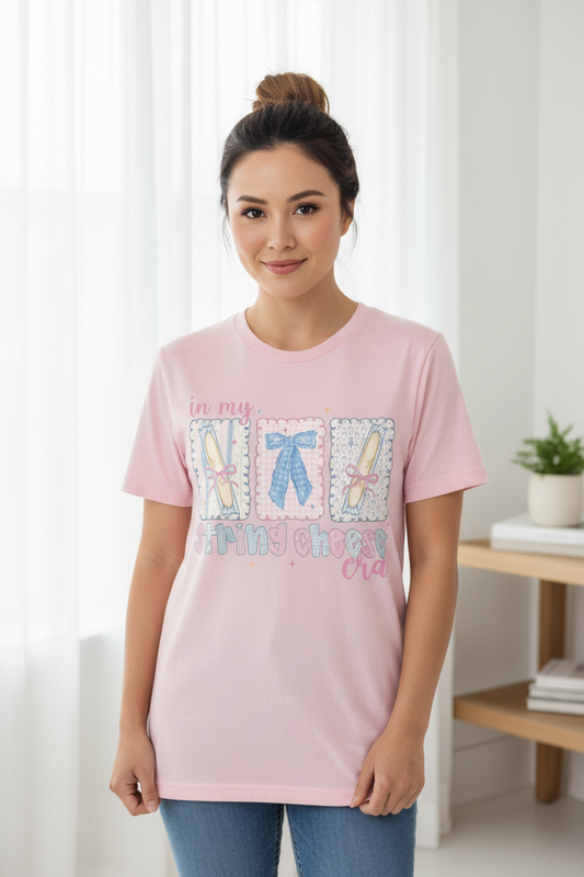 In My String Cheese Era tee worn on pink shirt