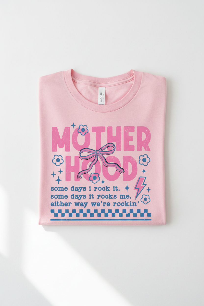 Motherhood tee folded flat lay product photo