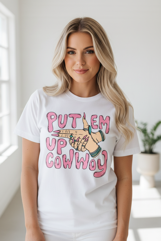 Put Em Up Cowboy tee worn on white shirt